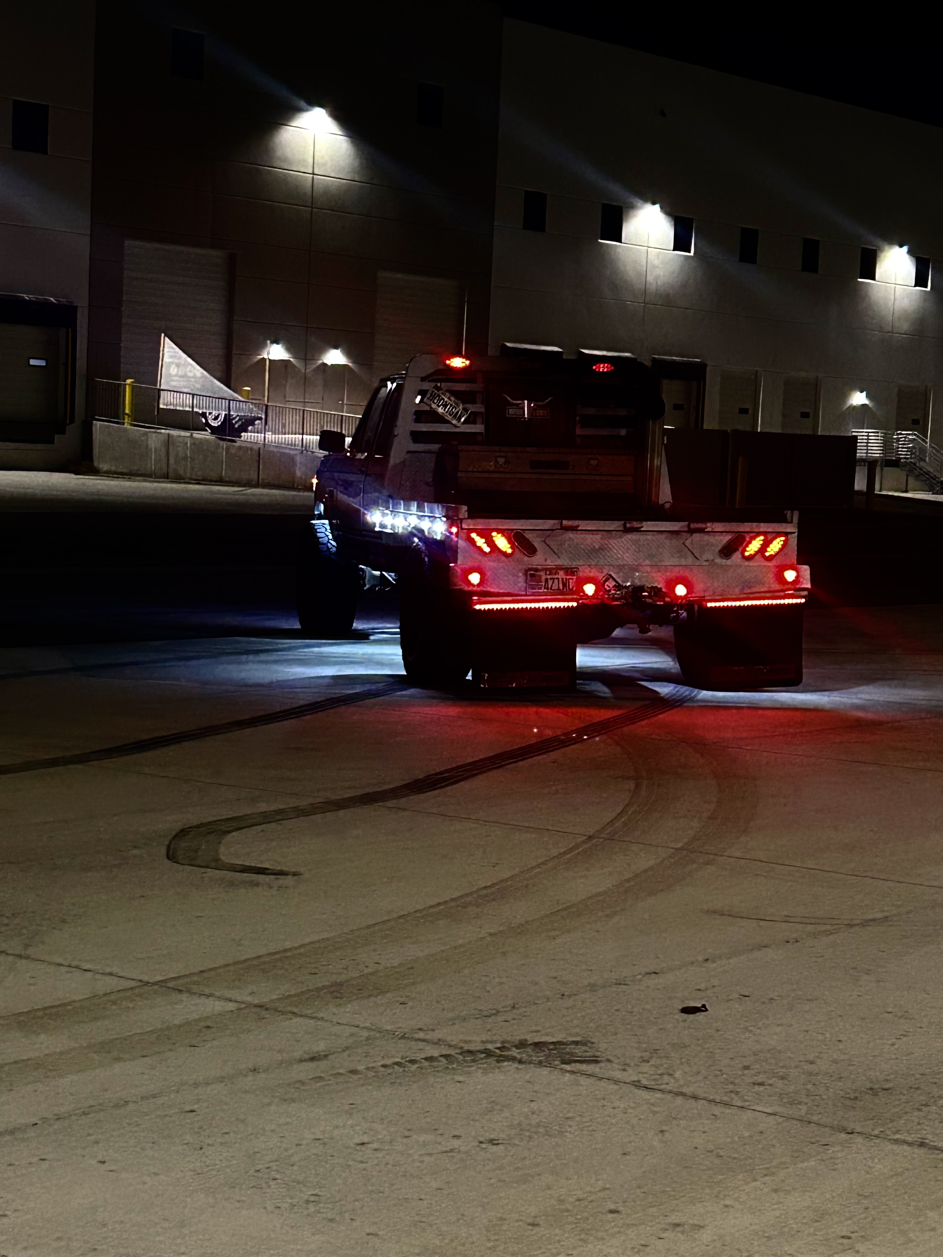 Rear view of custom flatbed with LED taillight and chase light setup